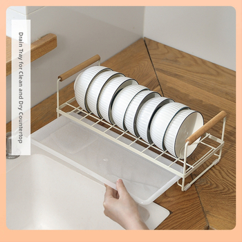 Notekšanas trauku statīvs – mūsdienīgs vienkāršs stils; materiāls: dzelzs māksla + PP; uzstādīšana bez urbšanas caurumiem; virtuves virsma traukiem; izlaiž 2023