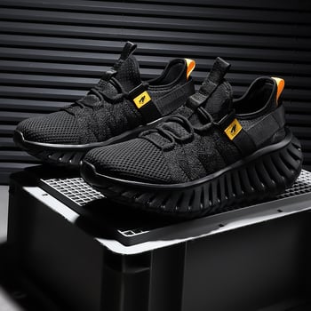 Férfi futócipők – Légáteresztő hálós felsőrész, ütéscsillapítás, fűzővel záródó, gumi talp