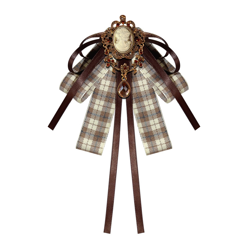 Textilből készült masni alakú bross, kockás mintával, brit retro stílusban, nőknek.