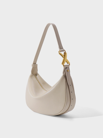 Moon crossbody τσάντα — γνήσιο δέρμα, αστικός μινιμαλισμός, σχήμα dumpling, άνοιγμα με φερμουάρ, επένδυση από δέρμα βοδιού