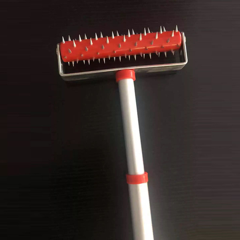 Инструмент за премахване на тапети с удължаваща се дръжка от алуминиева сплав и ролка със шипове