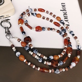 Найлонова каишка за телефон с геометрична керамична висулка и пластмасова катарама, висулката е включена