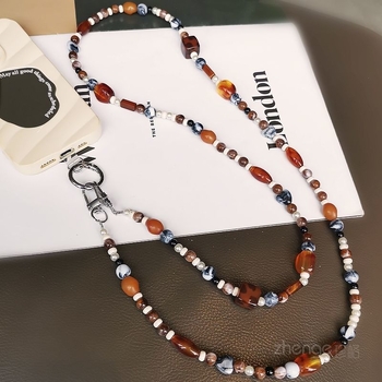 Найлонова каишка за телефон с геометрична керамична висулка и пластмасова катарама, висулката е включена