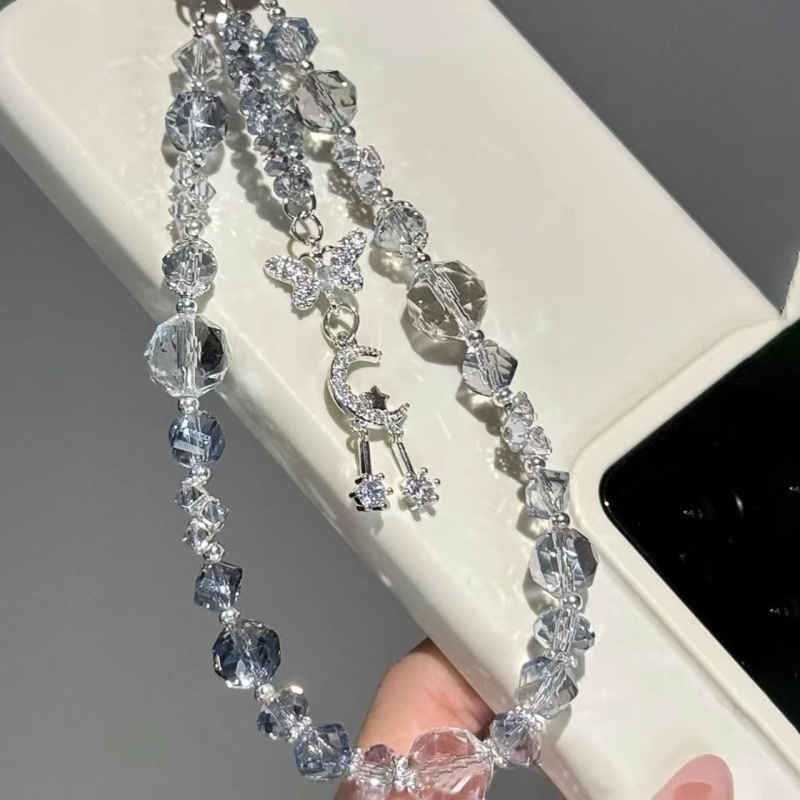 Telefonska ogrlica s perlicama - ručna izrada, materijal plastika/resin, privjesak ključa, motivi zvijezda/sunce/mjesec/oblaci/univerzum, ljeto 2025