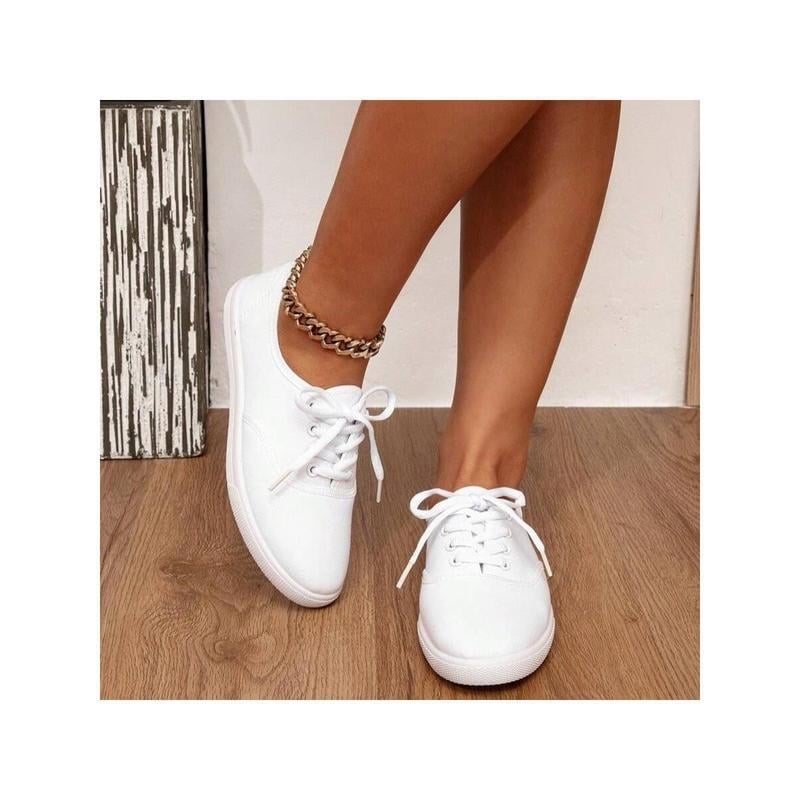 Ženske mules s gornjim dijelom od rafije, vunena podstava, okrugli nos, prugasti uzorak