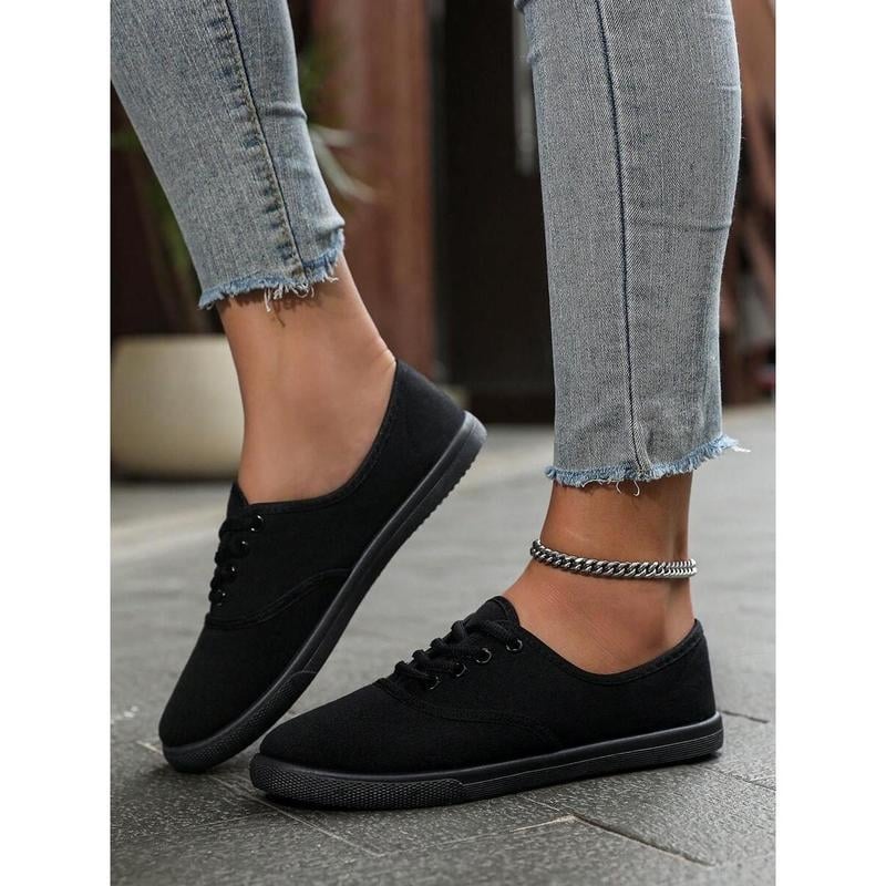 Ženske mules s gornjim dijelom od rafije, vunena podstava, okrugli nos, prugasti uzorak