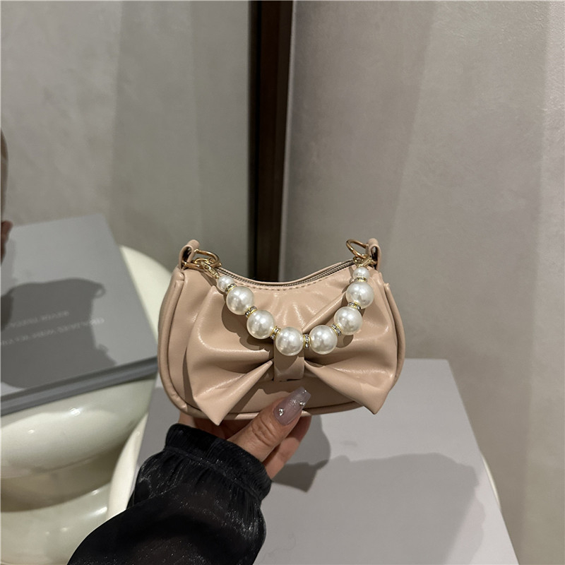 Torba za ruku s mašnicom od perla, PU materijal, street trend stil, zatvarač, unutarnja džep s zipom, podstava poliester, jedan remen, izdanje jesen 2025