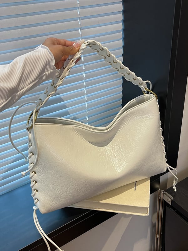 2025 őszi-téli tote táska fém szemdíszítéssel, nagy kapacitású, hétköznapi stílusú, crossbody egy vállon