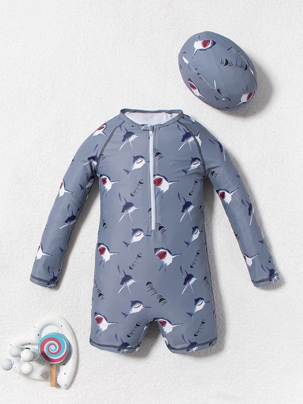 Poiste pikkade varrukatega ujumistrikoo karikatuurimustriga, suur elastsus ja päikesekaitse, 82% polüester / 18% spandeks, vanus 3–8 aastat