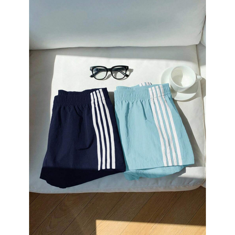 Șorturi casual pentru femei cu dungi pe lateral și talie elastică, croială lejeră (bumbac natural colorat • CVC • lungime 9/10 • elasticitate ușoară)