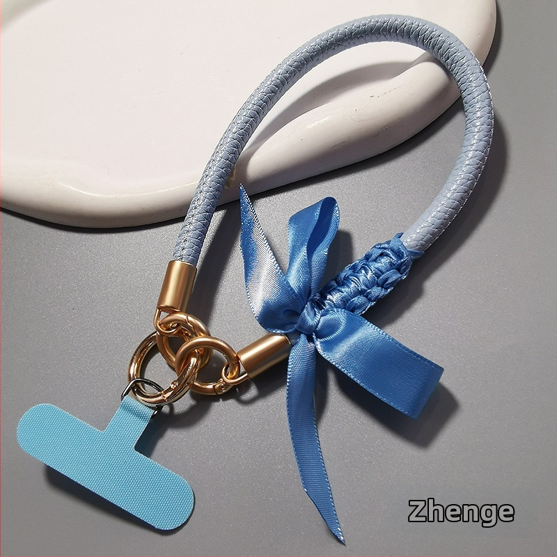 Δερμάτινο λουράκι για κινητό με φιόγκο, για γυναίκες, χειροποίητο, πολυλειτουργικό, μάρκα Jager, στυλ Chanel