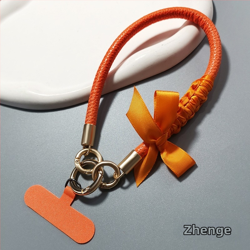 Δερμάτινο λουράκι για κινητό με φιόγκο, για γυναίκες, χειροποίητο, πολυλειτουργικό, μάρκα Jager, στυλ Chanel