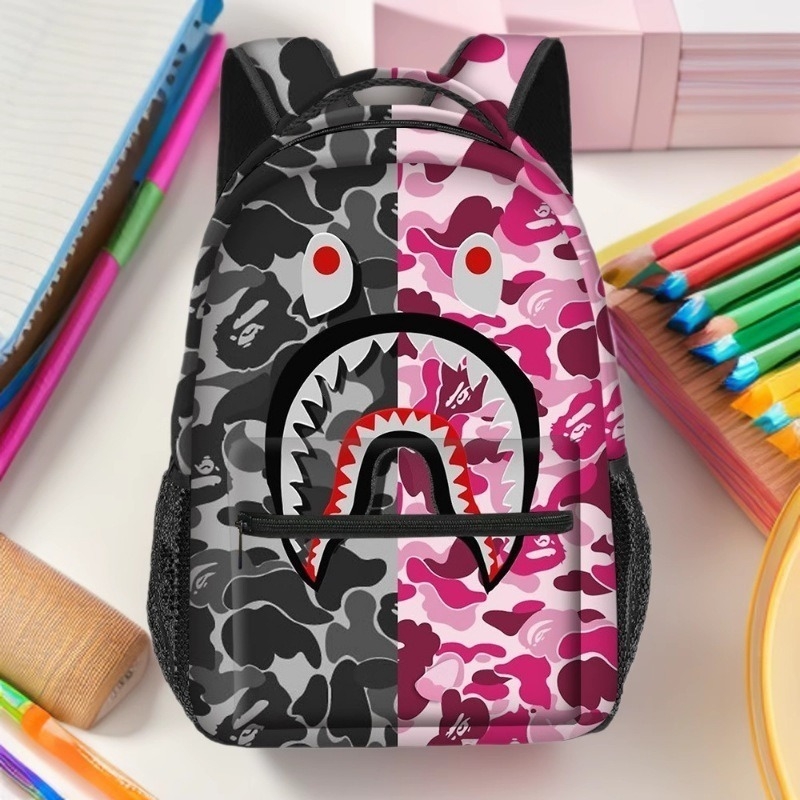 Skolas mugursoma pamatskolai - pilna drukāšana ar multfilmas attēlu, liela ietilpība, poliesters, gaisu spilventiņa siksnas, elpojoša