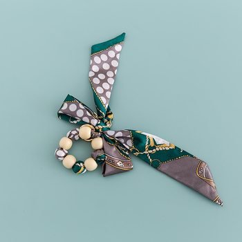 Κλειδάκι σε κορεατικό στυλ, ακρυλικό, με ξύλινες χάντρες και φιόγκο