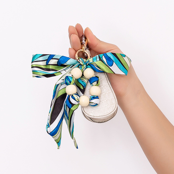 Κλειδάκι σε κορεατικό στυλ, ακρυλικό, με ξύλινες χάντρες και φιόγκο