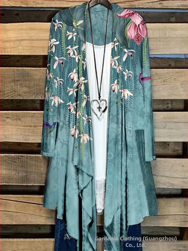 Moteriški marškiniai su ilgomis rankovėmis su spauda, ilgesnė kirpimo linija ir kailio apykakle, poliesteris