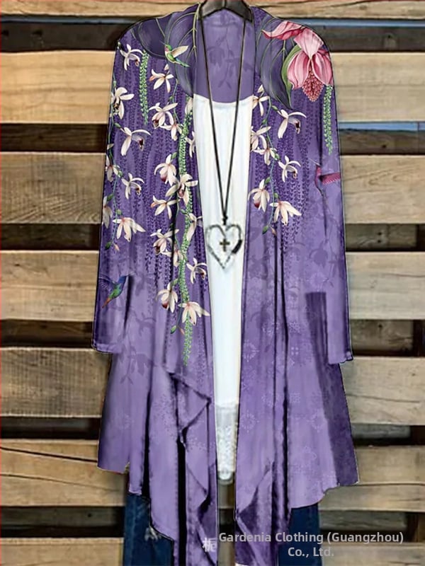 Moteriški marškiniai su ilgomis rankovėmis su spauda, ilgesnė kirpimo linija ir kailio apykakle, poliesteris