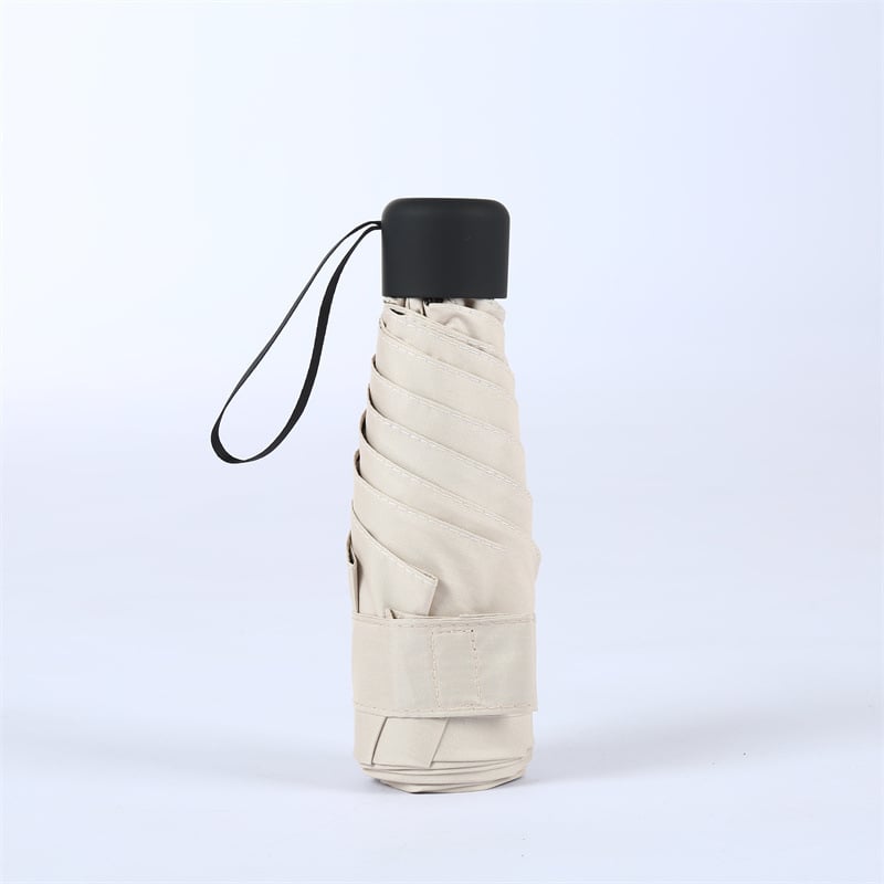 Компактен капсулен чадър, 6 ребра, ръчно отваряне, UPF > 50, плат 210T, железен прът