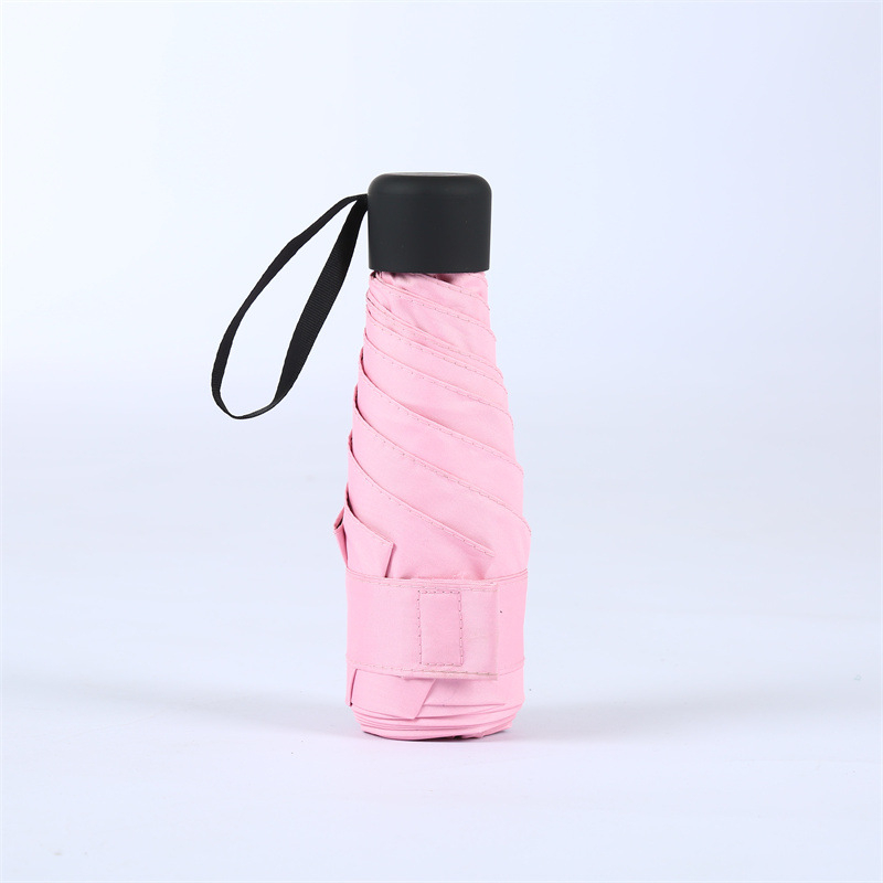 Компактен капсулен чадър, 6 ребра, ръчно отваряне, UPF > 50, плат 210T, железен прът