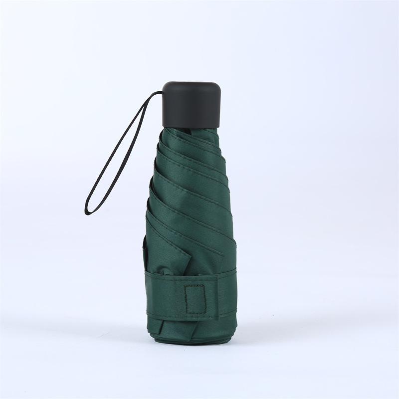 Компактен капсулен чадър, 6 ребра, ръчно отваряне, UPF > 50, плат 210T, железен прът