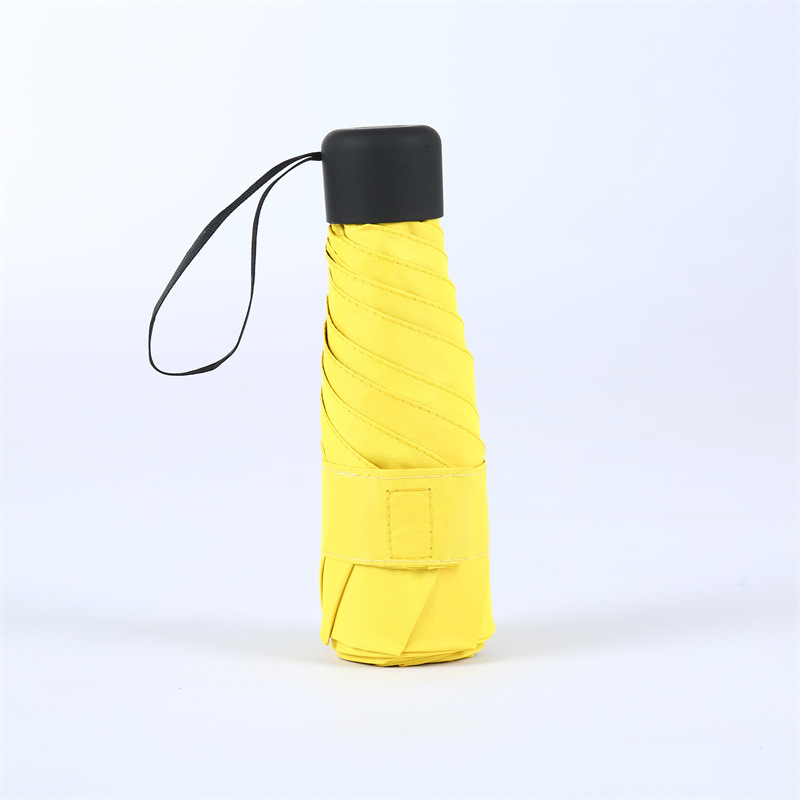 Компактен капсулен чадър, 6 ребра, ръчно отваряне, UPF > 50, плат 210T, железен прът