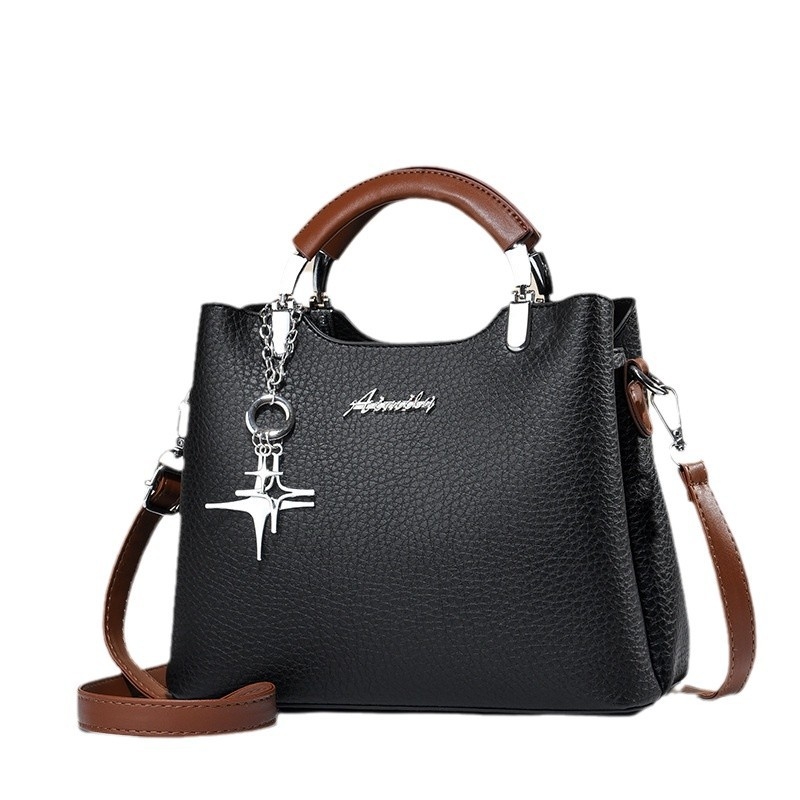 Kreisā pleca soma pilsētas stilā, PU materiāls, horizontāla kvadrāta forma, rāvējslēdzējs, poliestera oderējums, iekšējie kabatiņi telefonam, ID kartēm un kartēm