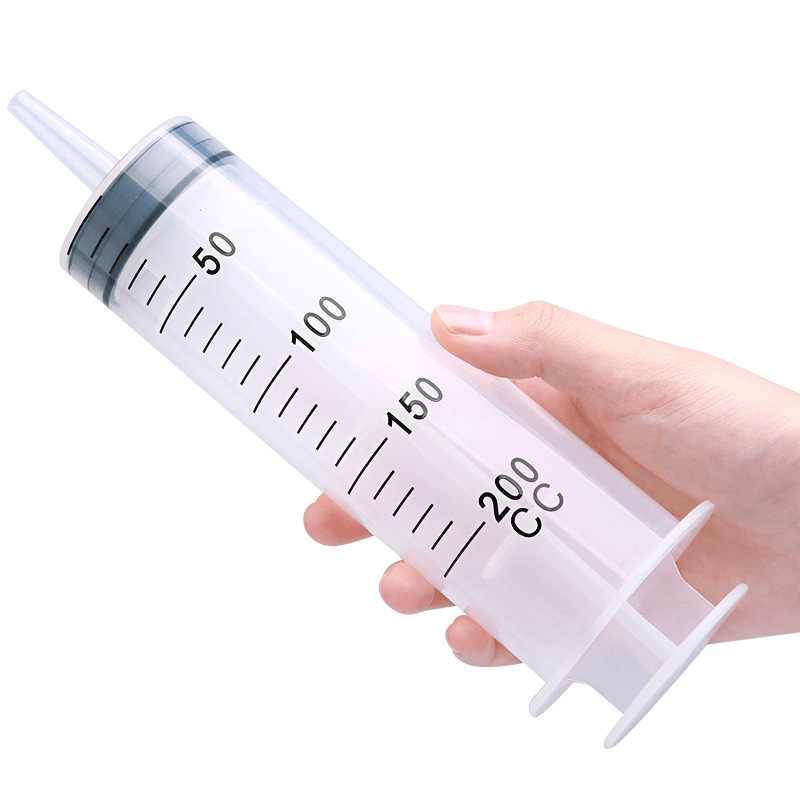 Πλαστική σύριγγα κλύσματος με βαθμονομημένες ενδείξεις, κατάλληλη για ενήλικες, σε ατομικά σφραγισμένο πακέτο