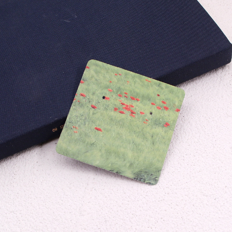 Komi auskarų ekspozicinė kortelė su 400 g vario plokštele, spalvotas spausdinimas, juvelyriniai dirbiniai