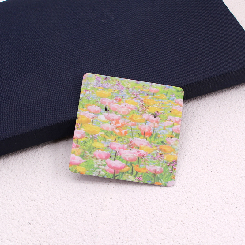 Komi auskarų ekspozicinė kortelė su 400 g vario plokštele, spalvotas spausdinimas, juvelyriniai dirbiniai