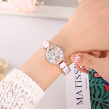 Γυναικείο ρολόϊ με κυκλικό καντράν και μεταλλικό μπρασελέ, μηχανισμός quartz, αντοχή στο νερό 10 μ., διάμετρος καντράν 29 mm