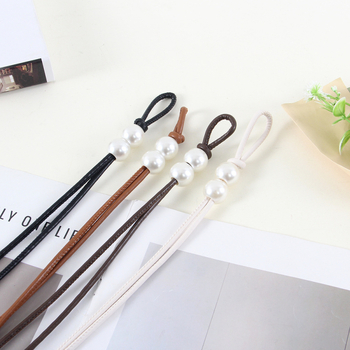 Γυναικεία ζώνη από PU δέρμα με πλαστικό κούμπωμα, ομαλό κλείσιμο, ρυθμιζόμενος μακρύς ζωνάρι μέσης — Καλοκαίρι 2025