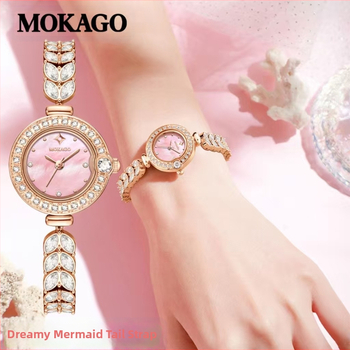 Naise kvartsikell teemantidega kaunistusega ja vasest kettaga kalasaba kujul, ümmargune kellakera (kvartsliikumine; teemantidega kaunistus; vasest kett kalasaba kujul; veekindlus 30 m; ümmargune kellakera)