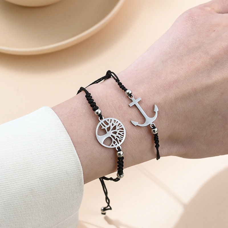 Karkötő ötvözetből, elektroplattázott kivitel, uniszex minimalist, motívum pillangó és Életfája