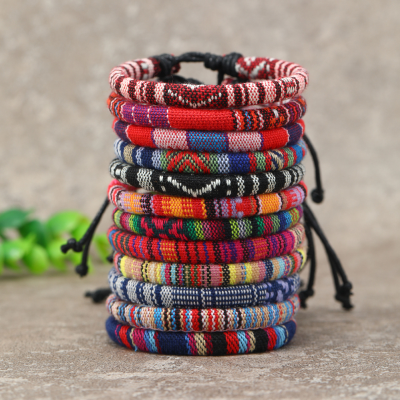 Kézzel szőtt karkötő, bohém etnikus stílus, uniszex, geometriai dizájn (Anyag: textil zsinór; Kézzel készült; 12 darabos készlet)