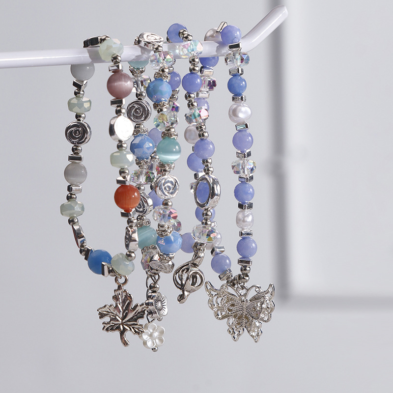 Apyrankė – Rankų darbo iš katės akies akmens moterims, geometrinis dizainas, vasara 2024