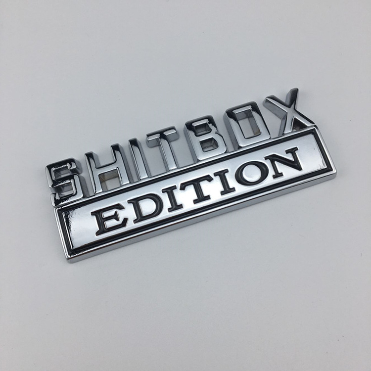 Automobilio emblema, cinko lydinys, SHITBOX EDITION, klijuota montavimas
