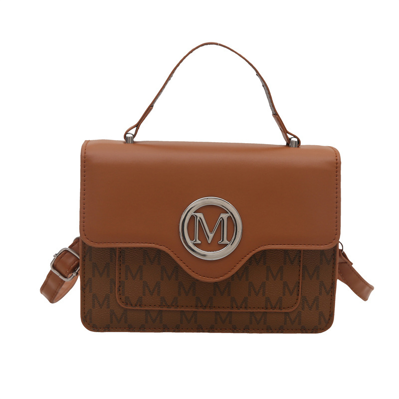 PU pleca soma ar pilsētas vienkāršu stilu, horizontāla kvadrāta forma, magnētiska aizdare, iekšējās kabatas telefona un ID kartes glabāšanai