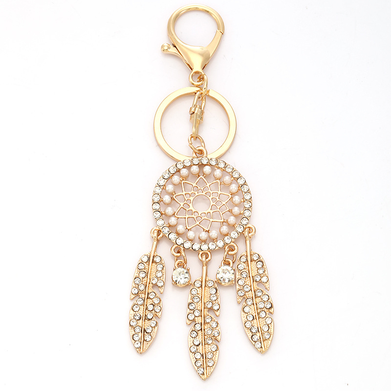 Palotai stílusú kulcstartó dreamcatcherrel, gyémántokkal díszítve, tollal, cinkötvözetből
