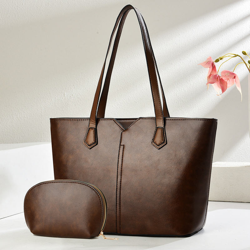 Tote rankinė – miesto minimalistinio stiliaus, PU medžiaga, poliesterio pamušalas, horizontalaus stačiakampio formos, užtrauktukas.