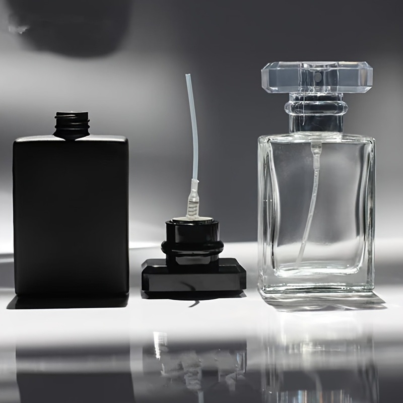 Set de 8 sticluțe de parfum din sticlă, cu formă pătrată și capac Tip-T