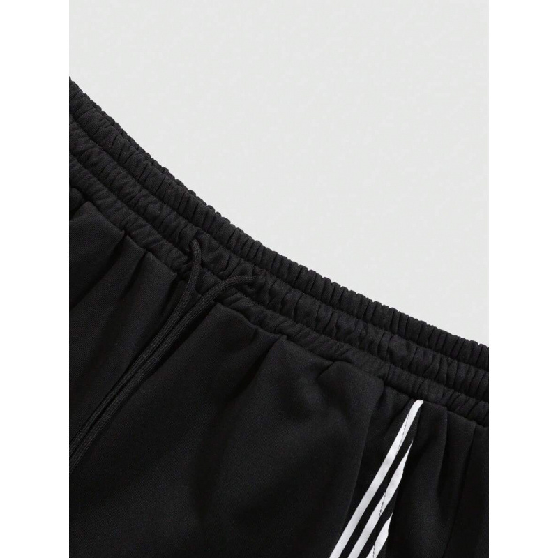 Laisvai siuvamas vyriškas marškinėliai su šūkio spauda ir juostele ant juosmens; natūralios medvilnės CVC mišinys; retro stilius.