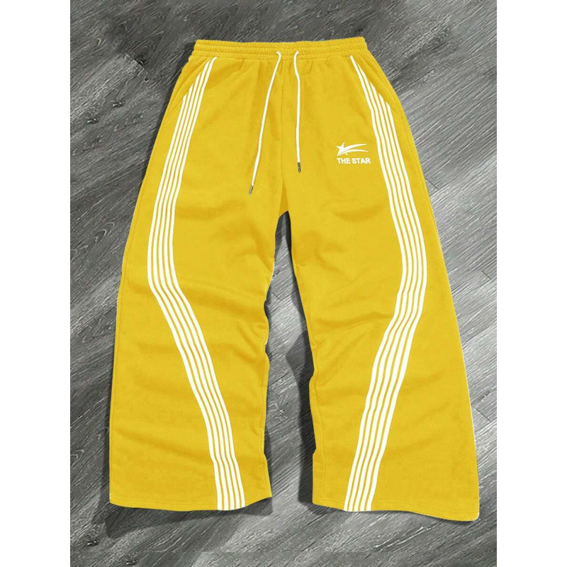 Laisvai siuvamas vyriškas marškinėliai su šūkio spauda ir juostele ant juosmens; natūralios medvilnės CVC mišinys; retro stilius.