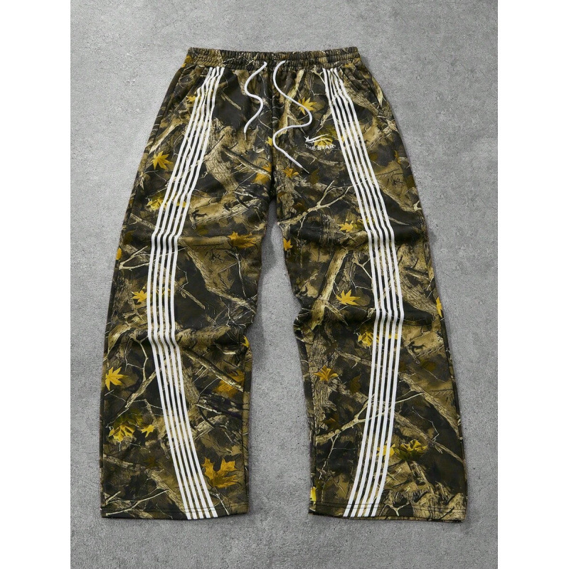 Laisvai siuvamas vyriškas marškinėliai su šūkio spauda ir juostele ant juosmens; natūralios medvilnės CVC mišinys; retro stilius.