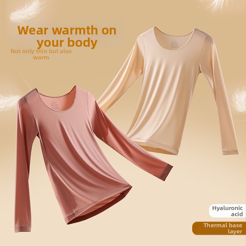 Нагряваща найлонова база за грижа за кожата с кръгло деколте и дълги ръкави; еднослойна конструкция, антистатична и запазва топлината