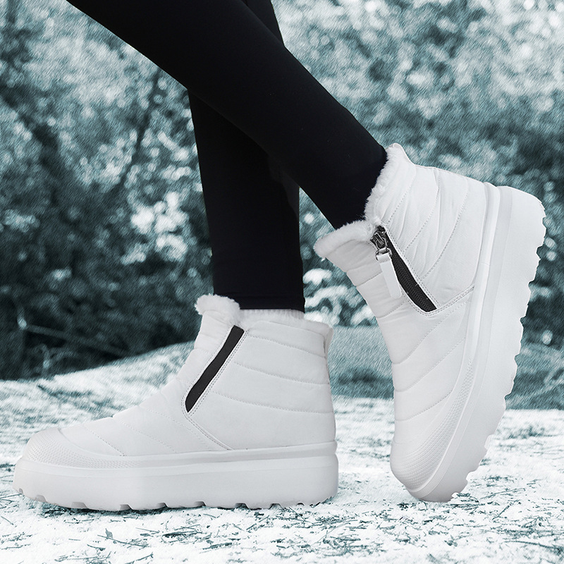 Sieviešu ziemas zābaki sniegam ar mākslīgu kažokādu iekšpusē, vidējā garuma līdz stilbam, gumijas zole, sānu rāvējslēdzējs, ikdienas stils