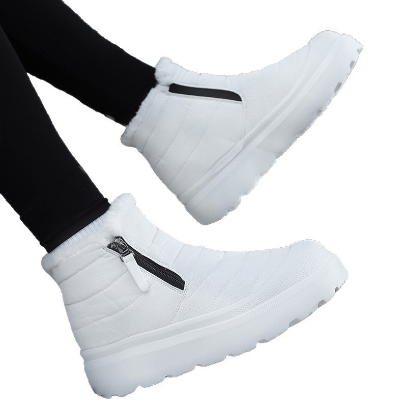 Sieviešu ziemas zābaki sniegam ar mākslīgu kažokādu iekšpusē, vidējā garuma līdz stilbam, gumijas zole, sānu rāvējslēdzējs, ikdienas stils