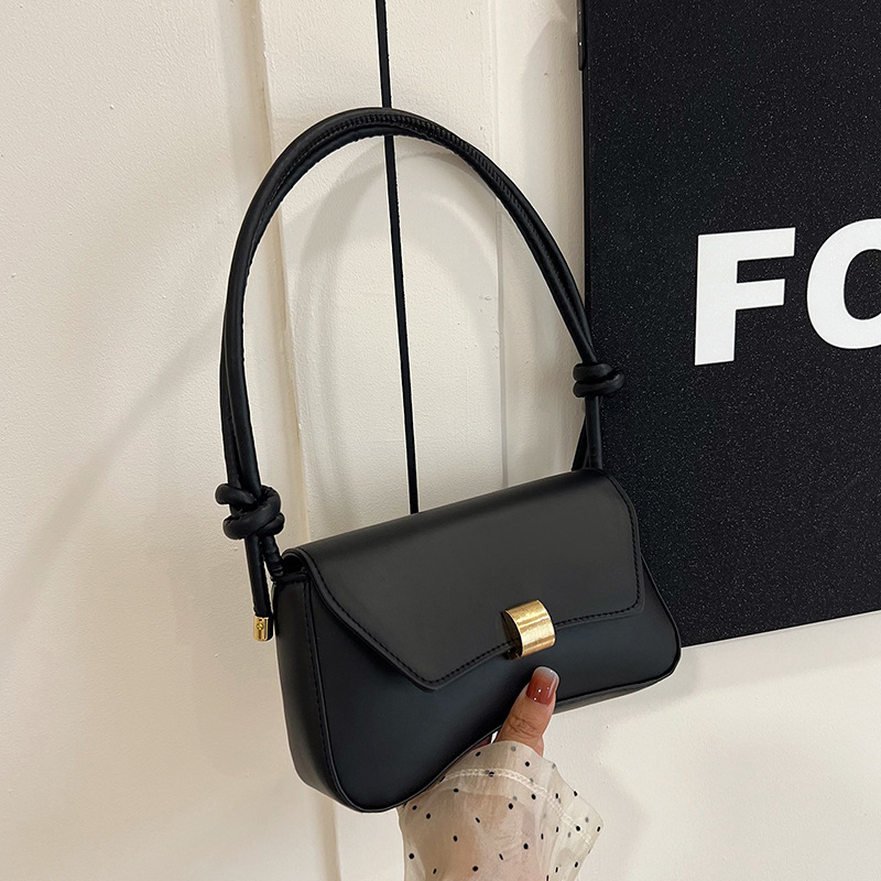 Pilsētas minimālisma stilā pleca soma, PU āda, horizontāla kvadrāta forma, aizvērums ar slēdzi, iekšējā kabata ar rāvējslēdzēju, apdare no sintētiskās ādas, viena plecu siksna, ikdienas lietošanai