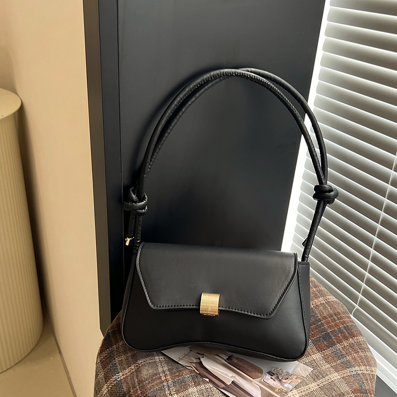 Pilsētas minimālisma stilā pleca soma, PU āda, horizontāla kvadrāta forma, aizvērums ar slēdzi, iekšējā kabata ar rāvējslēdzēju, apdare no sintētiskās ādas, viena plecu siksna, ikdienas lietošanai