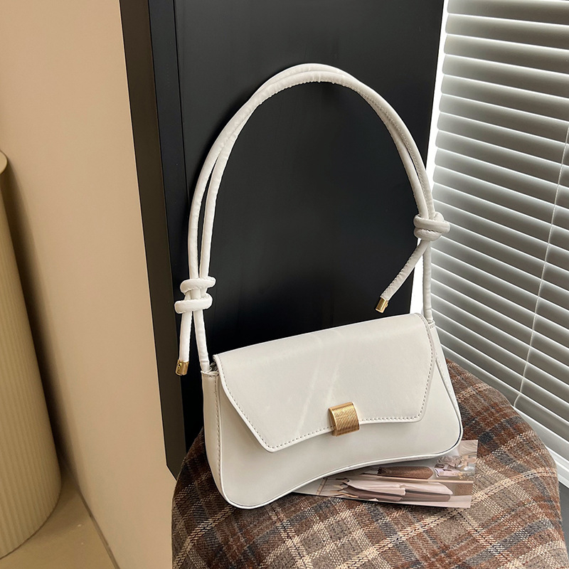 Pilsētas minimālisma stilā pleca soma, PU āda, horizontāla kvadrāta forma, aizvērums ar slēdzi, iekšējā kabata ar rāvējslēdzēju, apdare no sintētiskās ādas, viena plecu siksna, ikdienas lietošanai