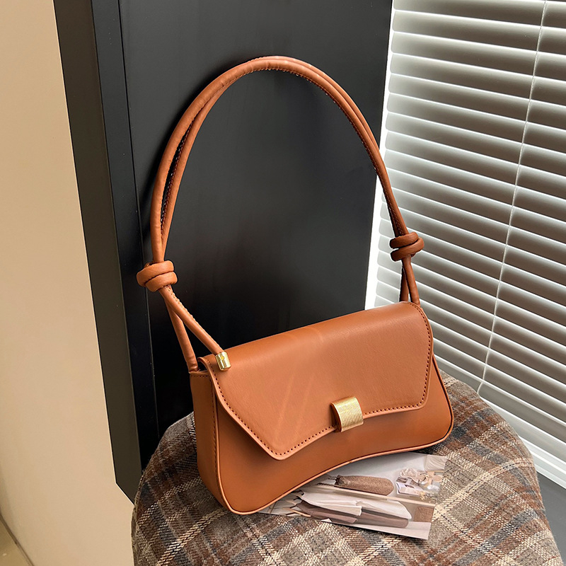 Pilsētas minimālisma stilā pleca soma, PU āda, horizontāla kvadrāta forma, aizvērums ar slēdzi, iekšējā kabata ar rāvējslēdzēju, apdare no sintētiskās ādas, viena plecu siksna, ikdienas lietošanai